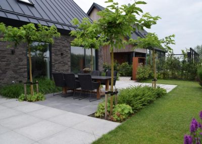 achtertuin met uitbundige en verrassende beplanting dutch quality gardens 5